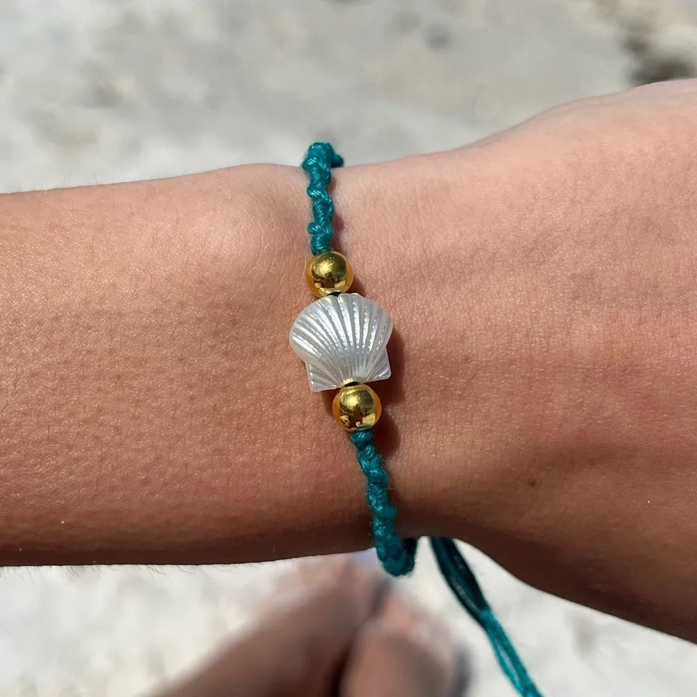 Handmade woven teal pearl shell gold bead bracelet